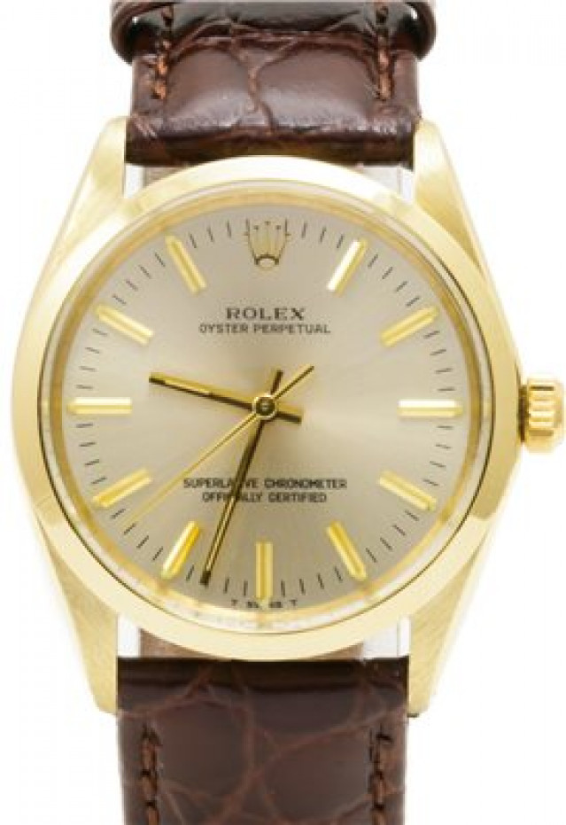 Rolex 1002 Yellow Gold on Strap, Smooth Bezel Champagne with Gold Index